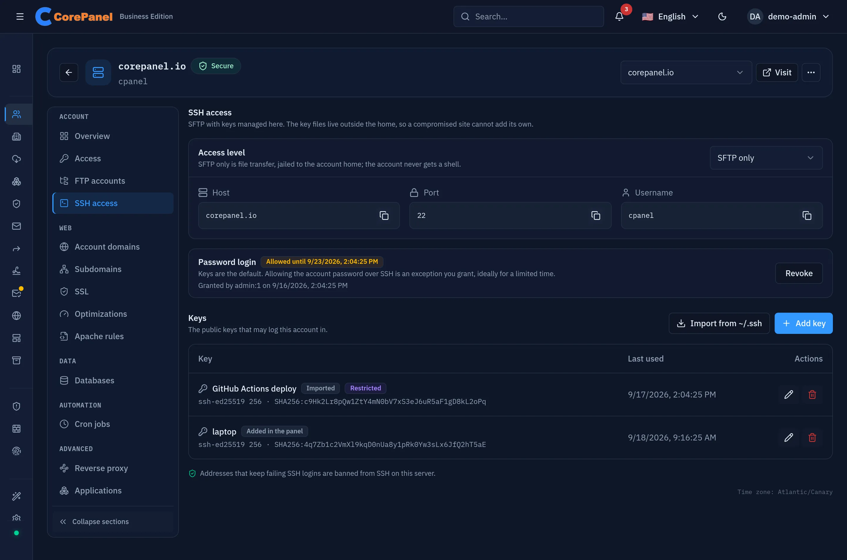 The SSH access section of an account workspace for corepanel.io. At the top, the Access level card with a selector reading "SFTP only" and the sentence "SFTP only is file transfer, jailed to the account home; the account never gets a shell", above three copyable fields: host corepanel.io, port 22 and username cpanel. Below it, the Password login card carries an amber "Allowed until 9/23/2026" badge, the note that the account password opens file transfer and never a console, who granted it and when, and a Revoke button. The Keys table lists two ed25519 keys with their fingerprints and when each was last used — "GitHub Actions deploy", tagged Imported and Restricted, and "laptop", tagged Added in the panel — with rename and remove buttons, under Import from ~/.ssh and Add key. A footnote says addresses that keep failing SSH logins are banned from SSH on this server.