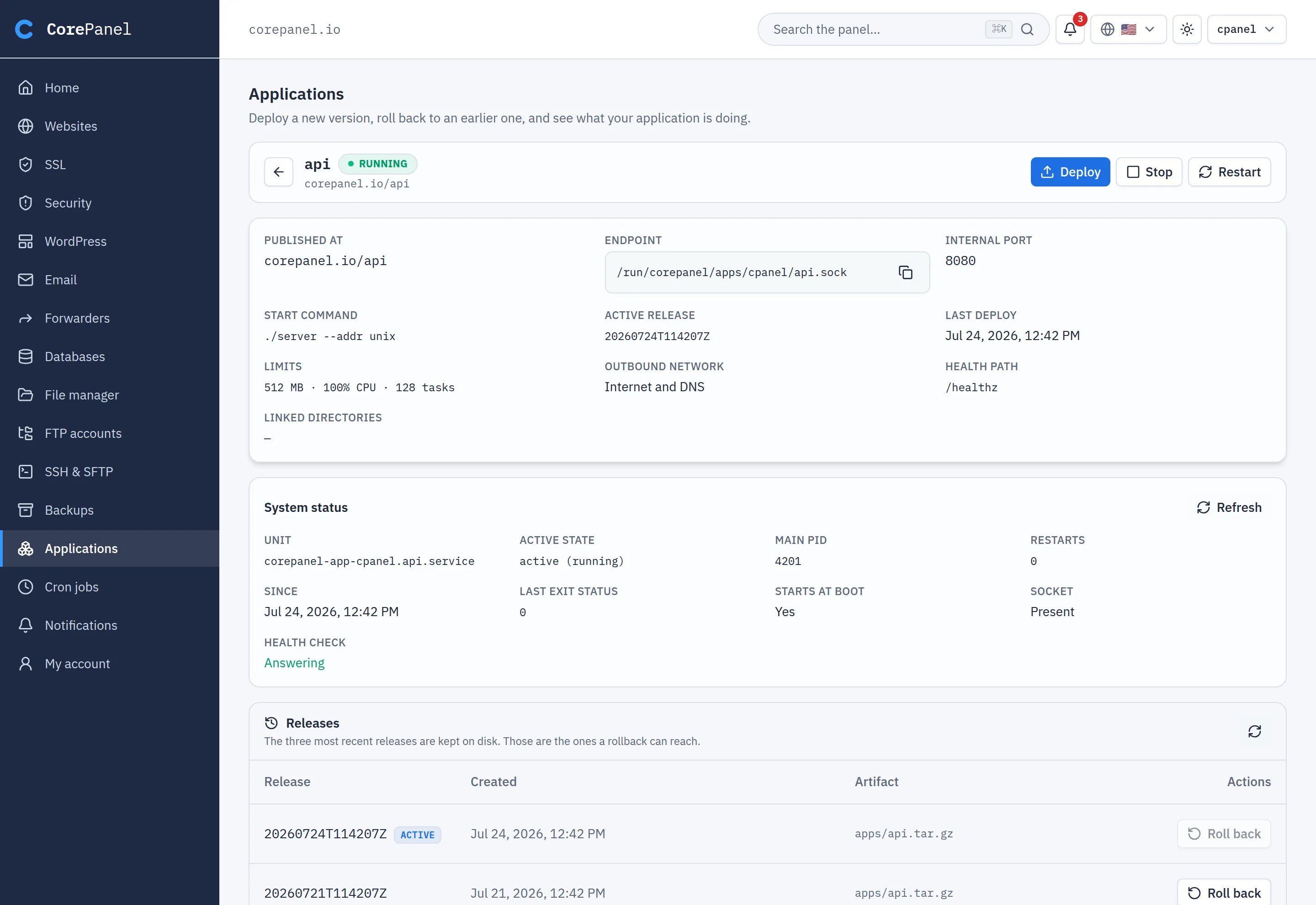 One application open in the client panel: the header "api", tagged RUNNING and published at corepanel.io/api, with Deploy, Stop and Restart at the right — and no Edit or Delete. Below it the specification read-only (start command ./server --addr unix, limits 512 MB · 100% CPU · 128 tasks, outbound network "Internet and DNS", health path /healthz), a "System status" card giving the unit, active state, main pid and restarts as systemd reports them plus a Health check reading "Answering", and a "Releases" table of three releases, the newest tagged ACTIVE and the two older ones each offering "Roll back".